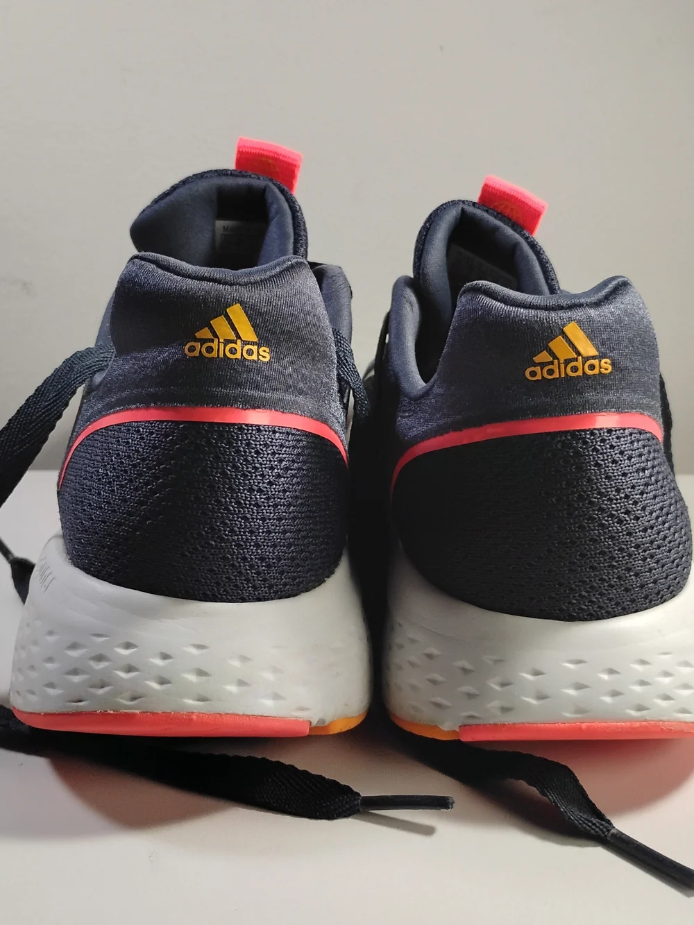 adidas Edge Lux 5 Women Navy Knit Running Sneakers with Neon Orange Accents